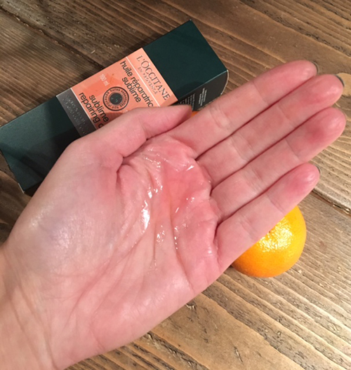 L'Occitane Sublime Repairing Oil in Hand